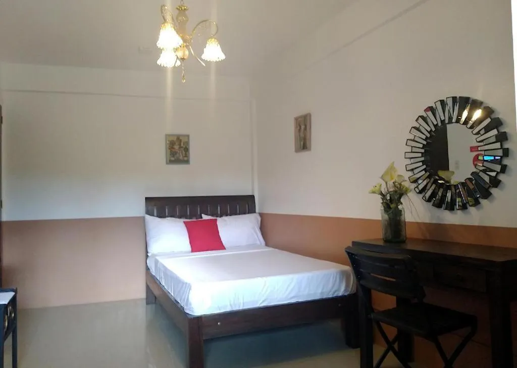 Bed in Jil's Apartelle