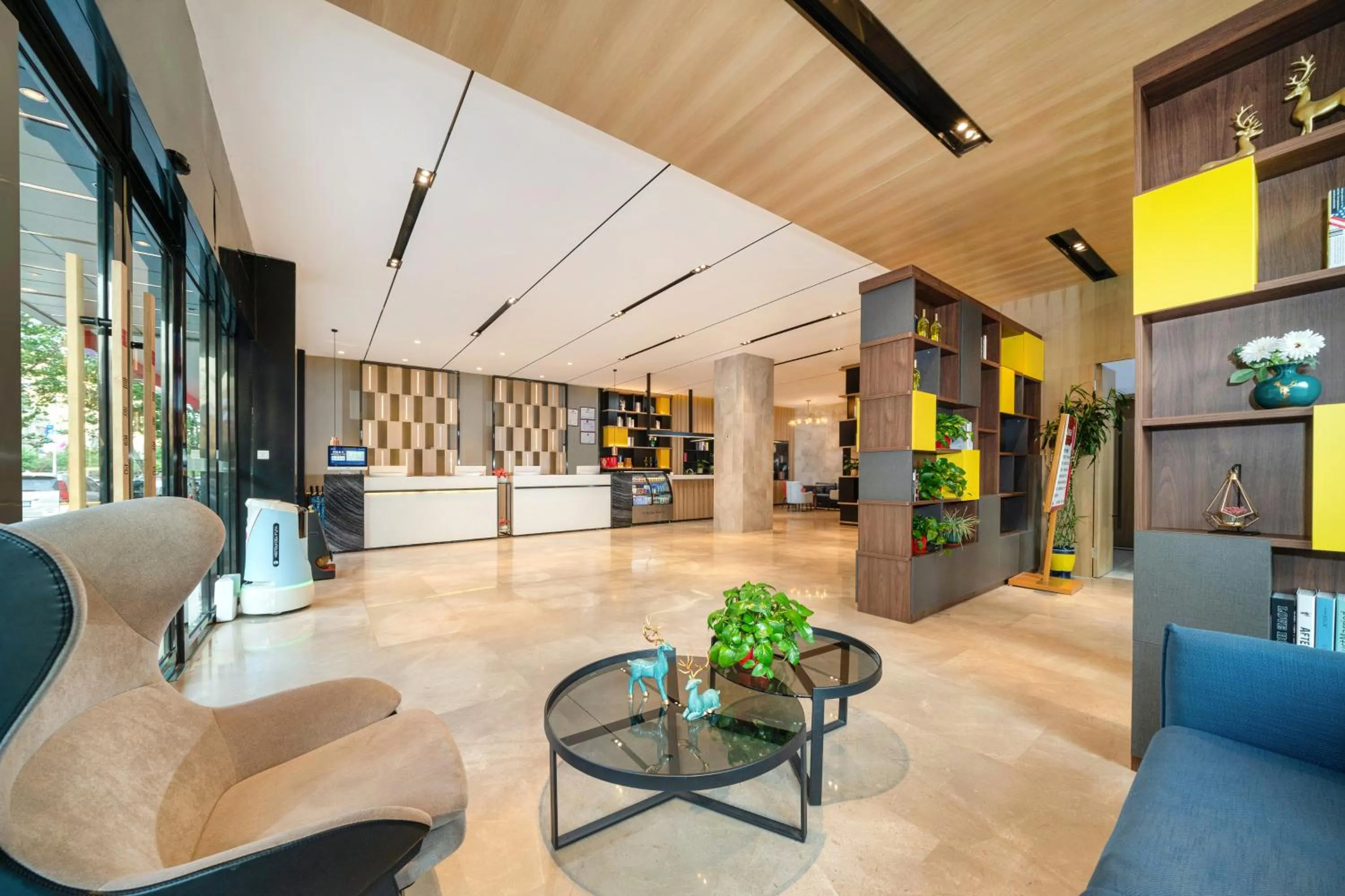 Lobby or reception in Echarm Hotel Wuzhou Canghai Lake High Speed Railway Station