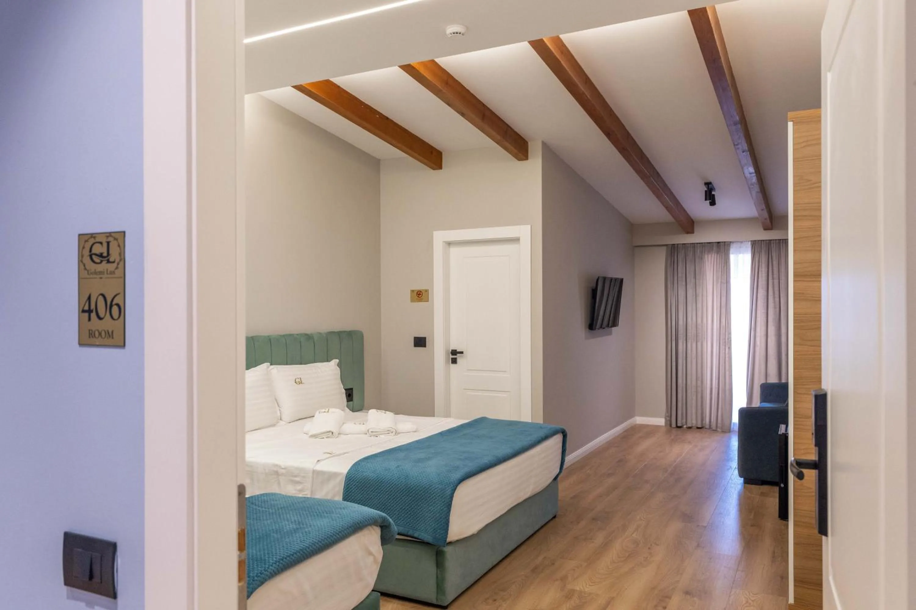 Bed in Golemi Lux Hotel