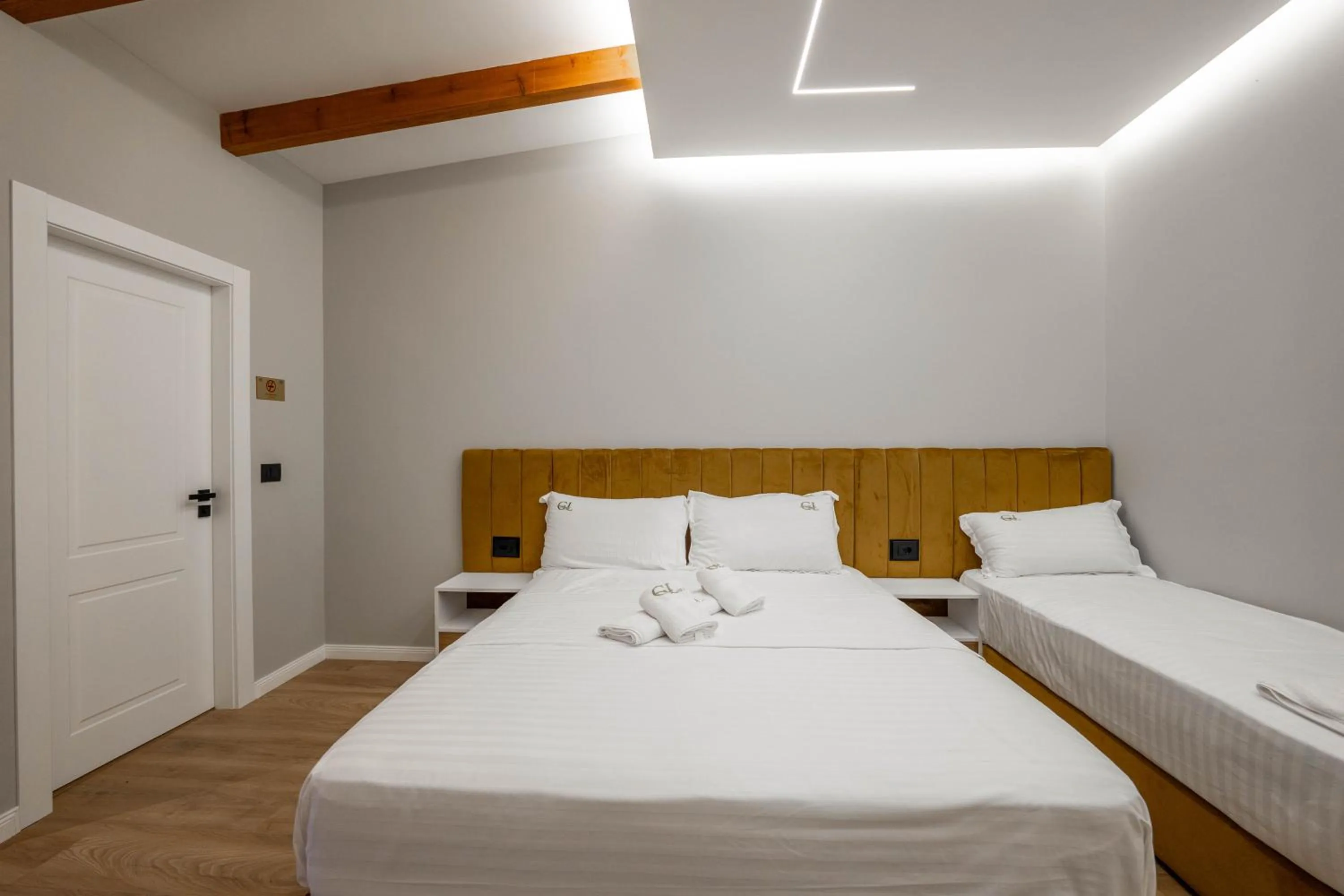 Bed in Golemi Lux Hotel