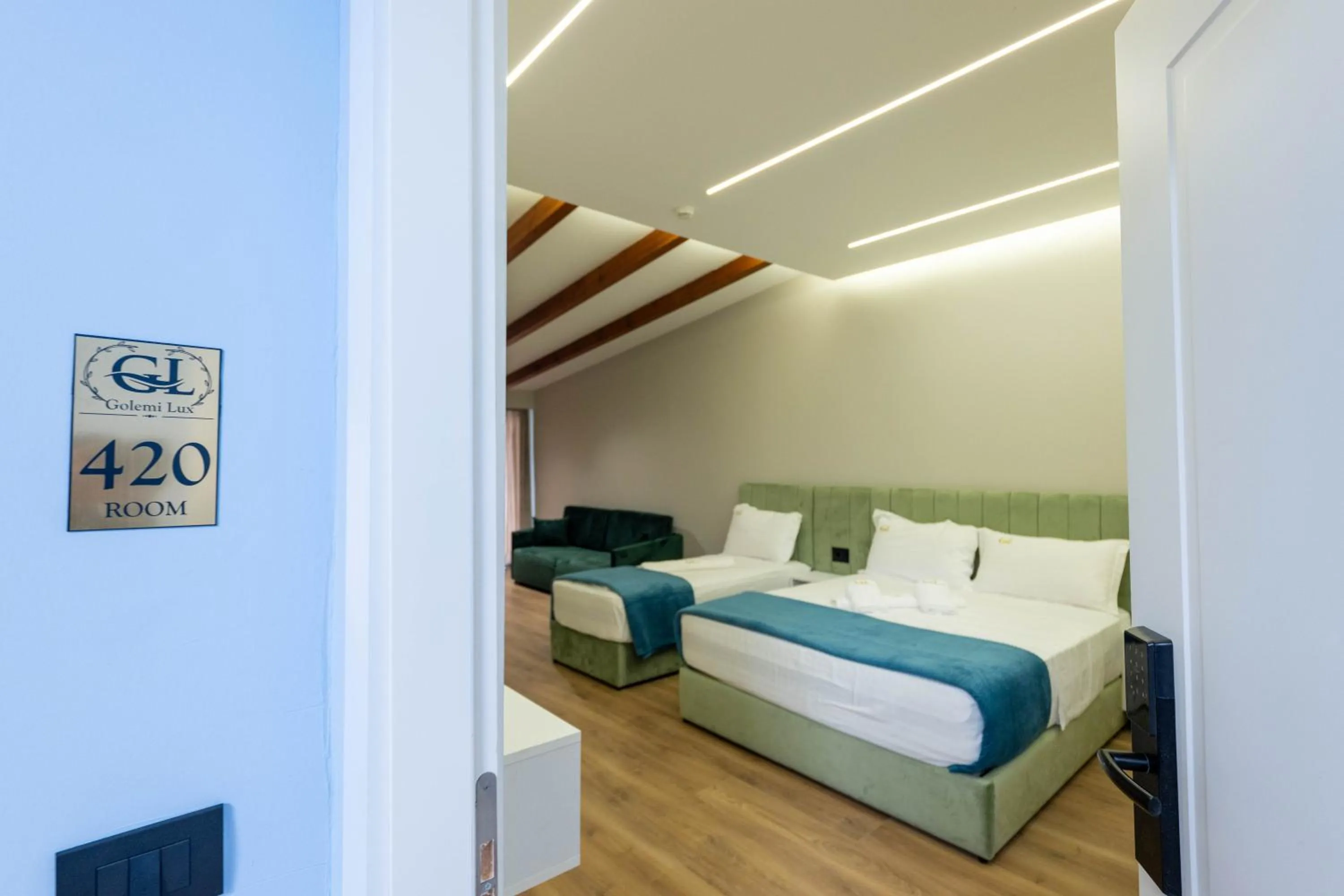 Bed in Golemi Lux Hotel