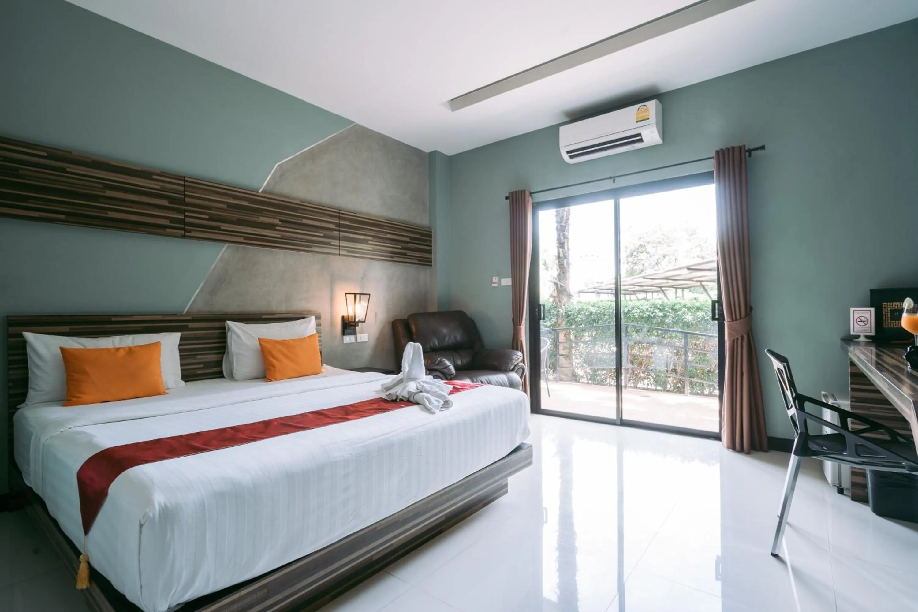 Photo of the whole room, Bed in Ray Hotel Buriram