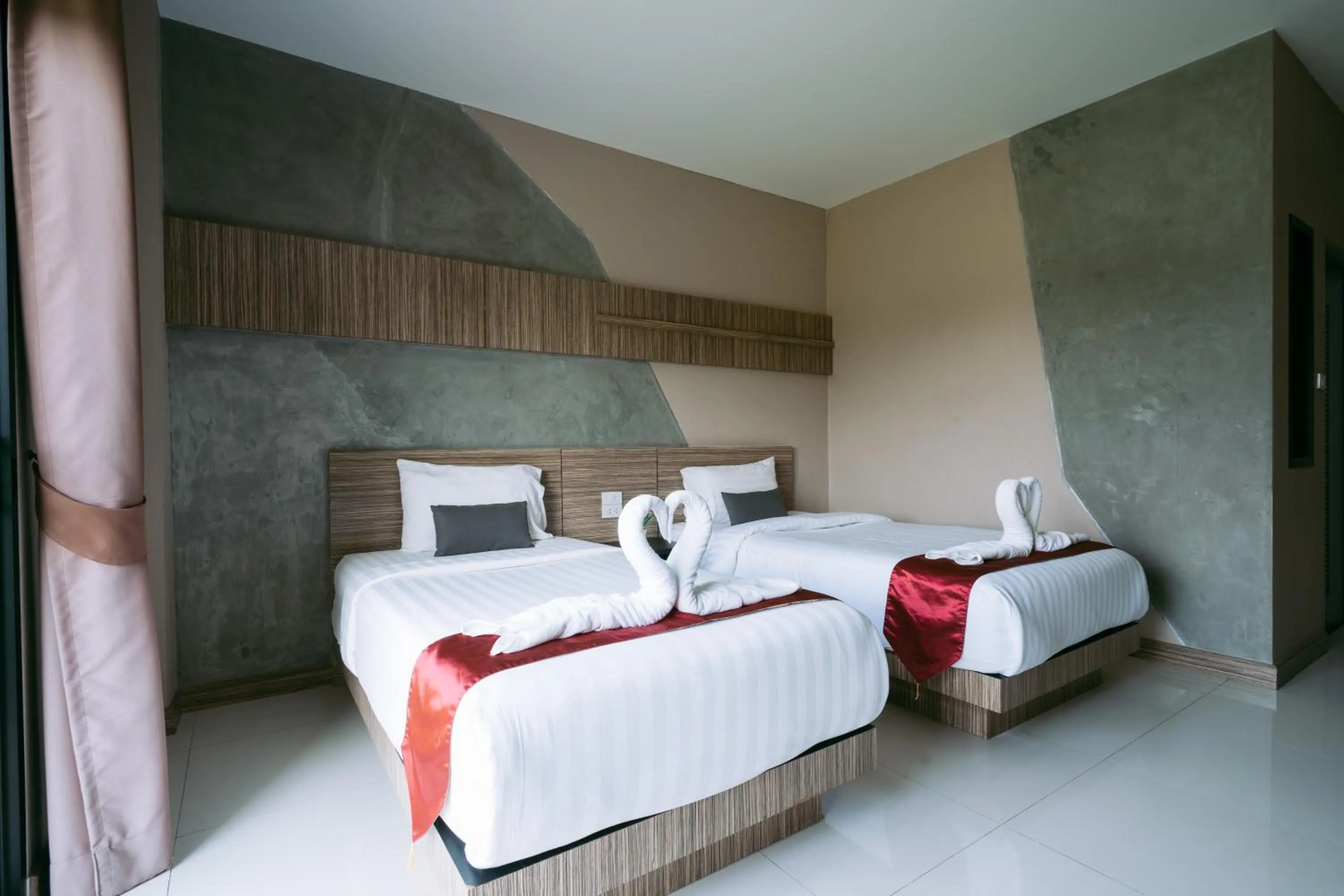 Bed in Ray Hotel Buriram