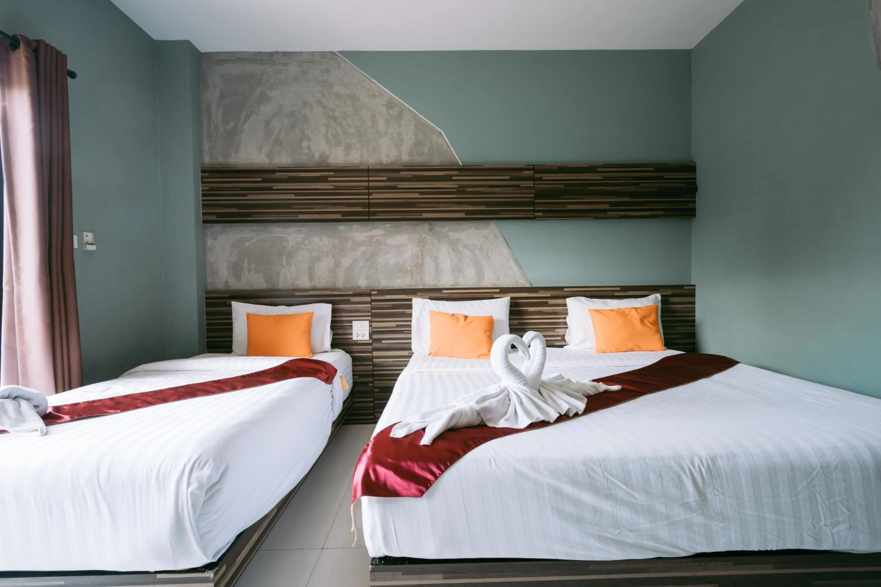 Bed in Ray Hotel Buriram