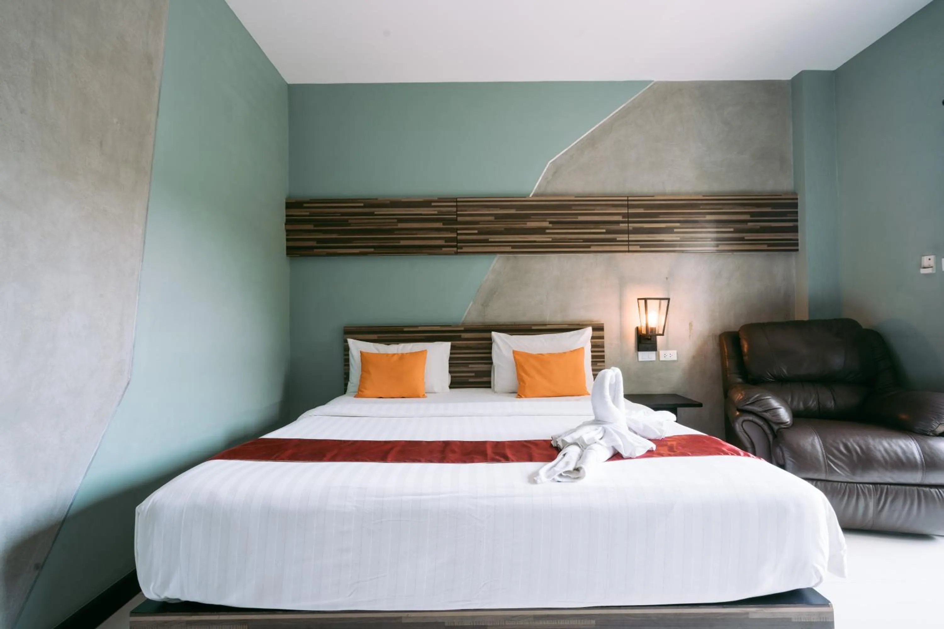 Bed in Ray Hotel Buriram