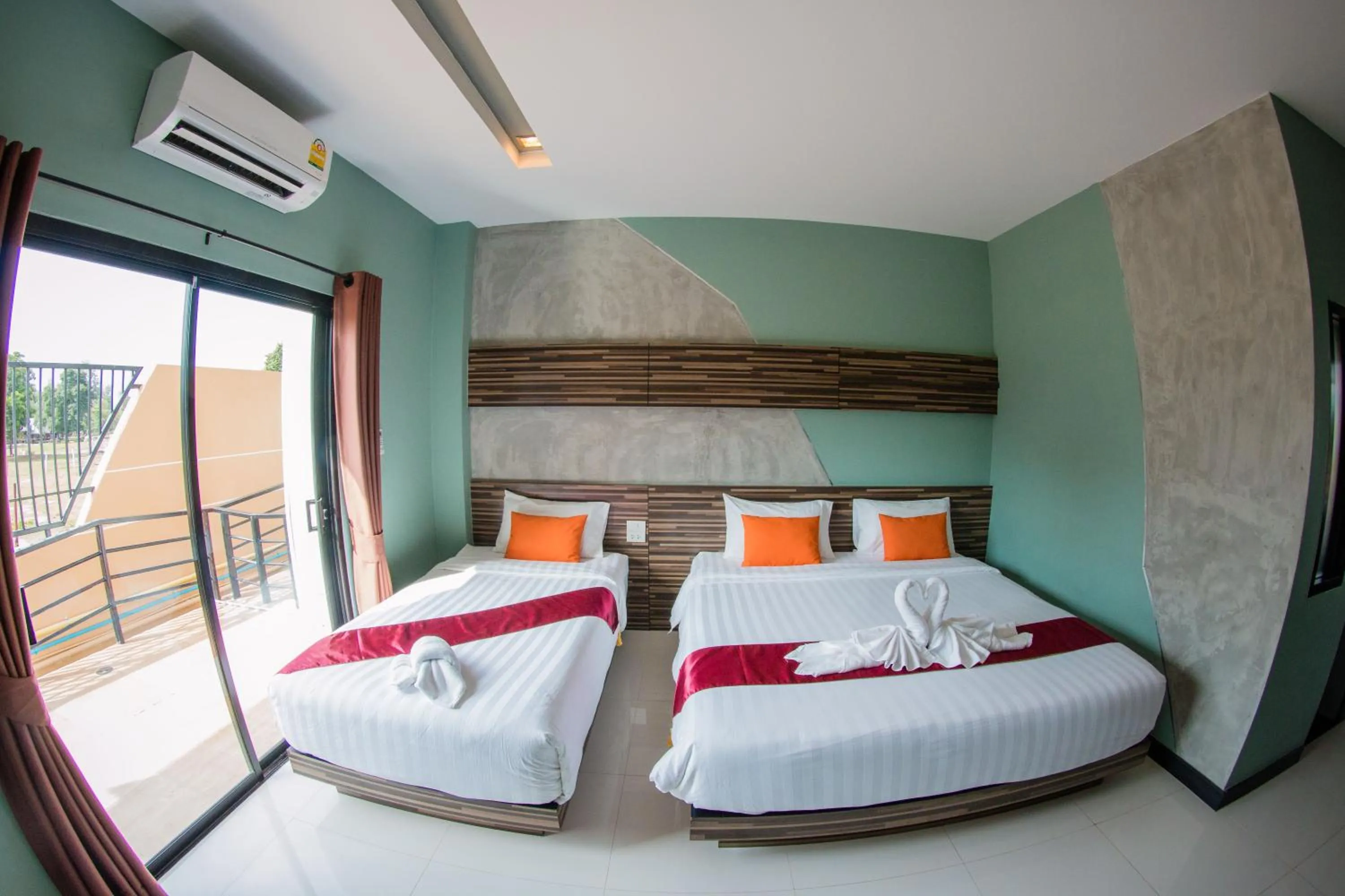 Bed in Ray Hotel Buriram