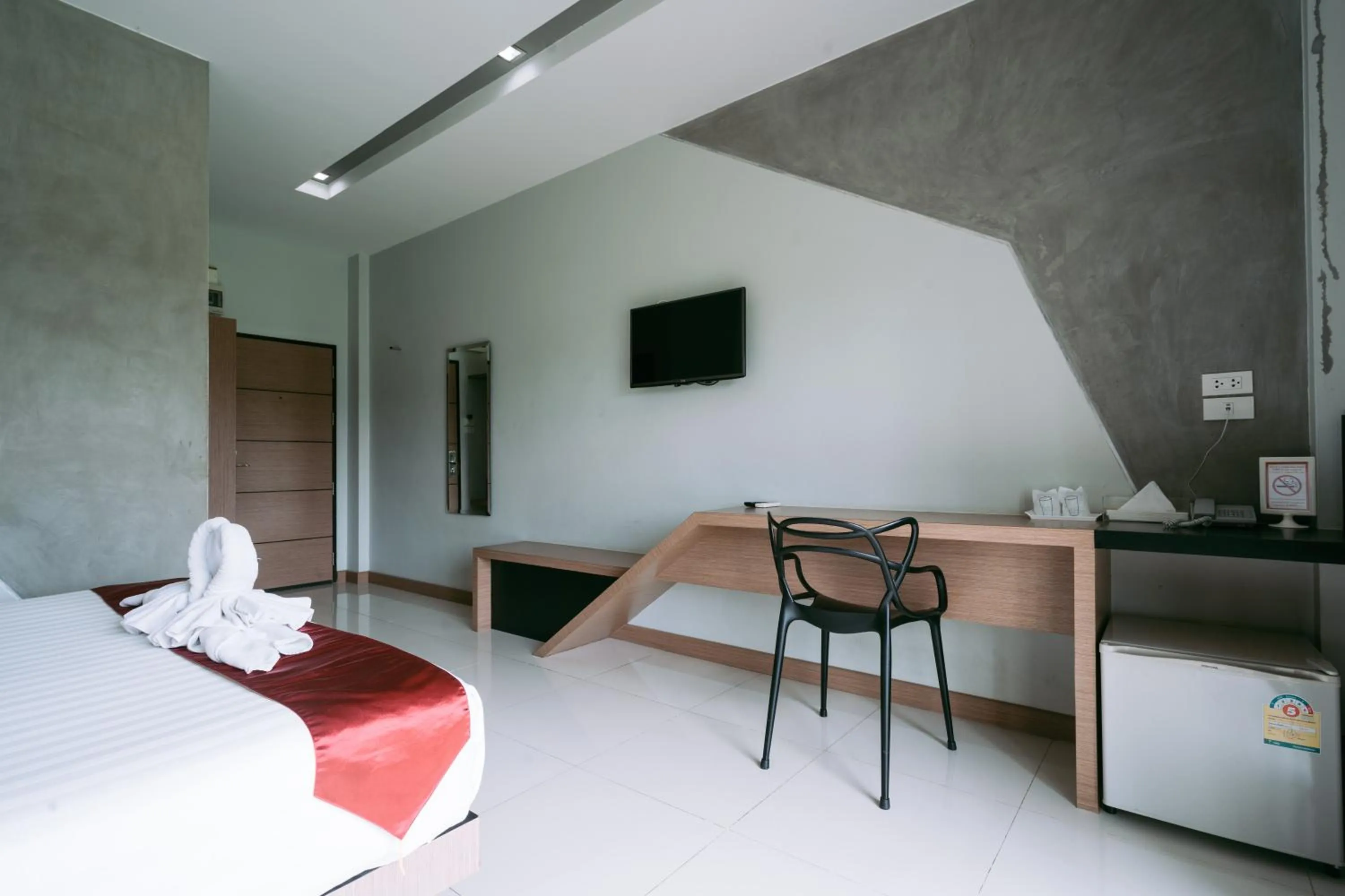 Photo of the whole room, Bed in Ray Hotel Buriram