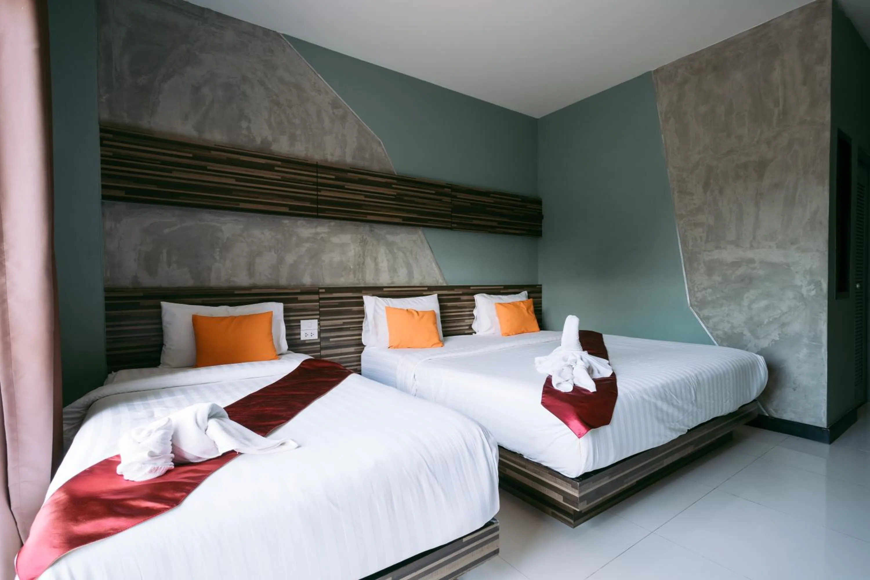 Bed in Ray Hotel Buriram