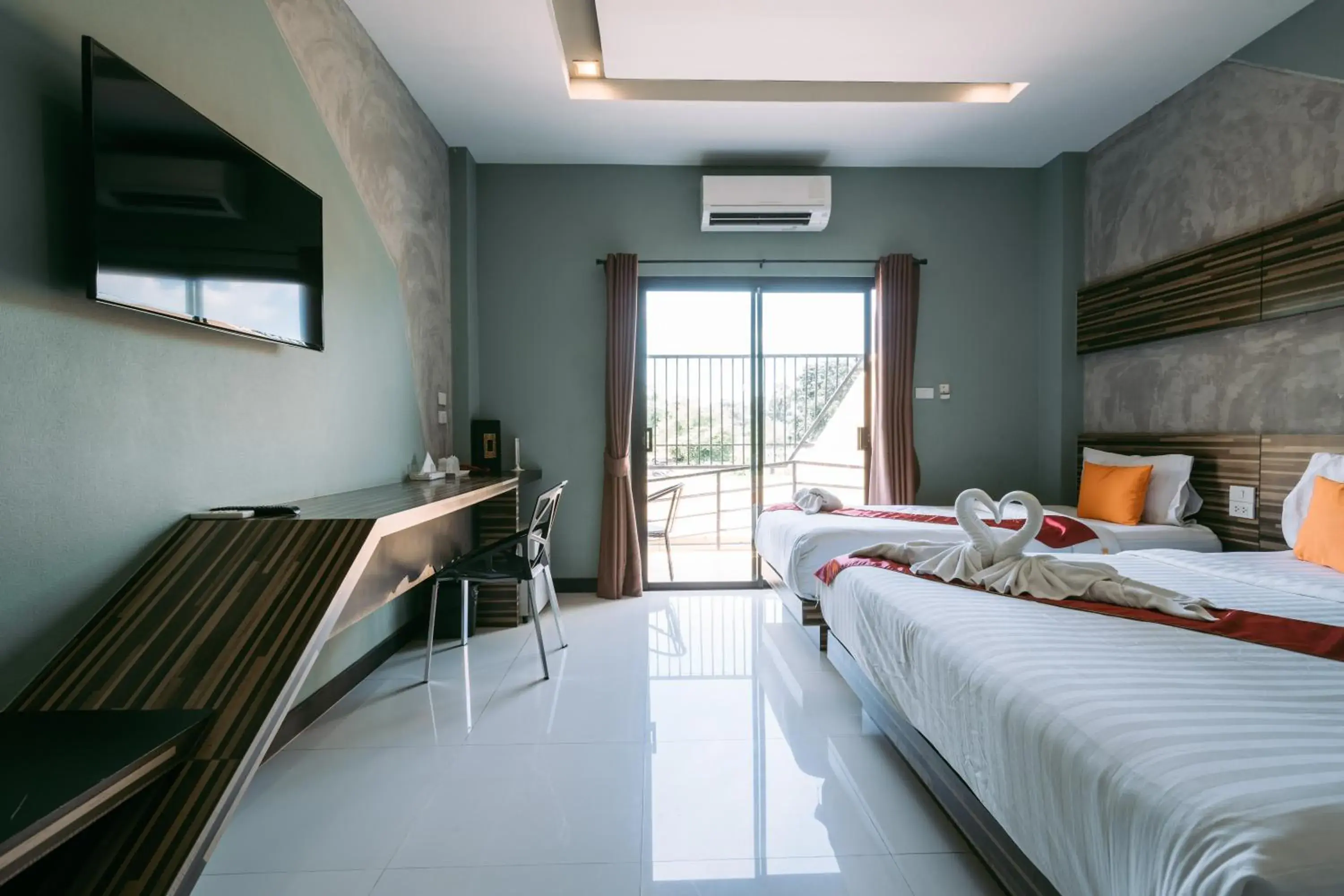 TV and multimedia, Bed in Ray Hotel Buriram TV and multimedia, Bed in Ray Hotel Buriram