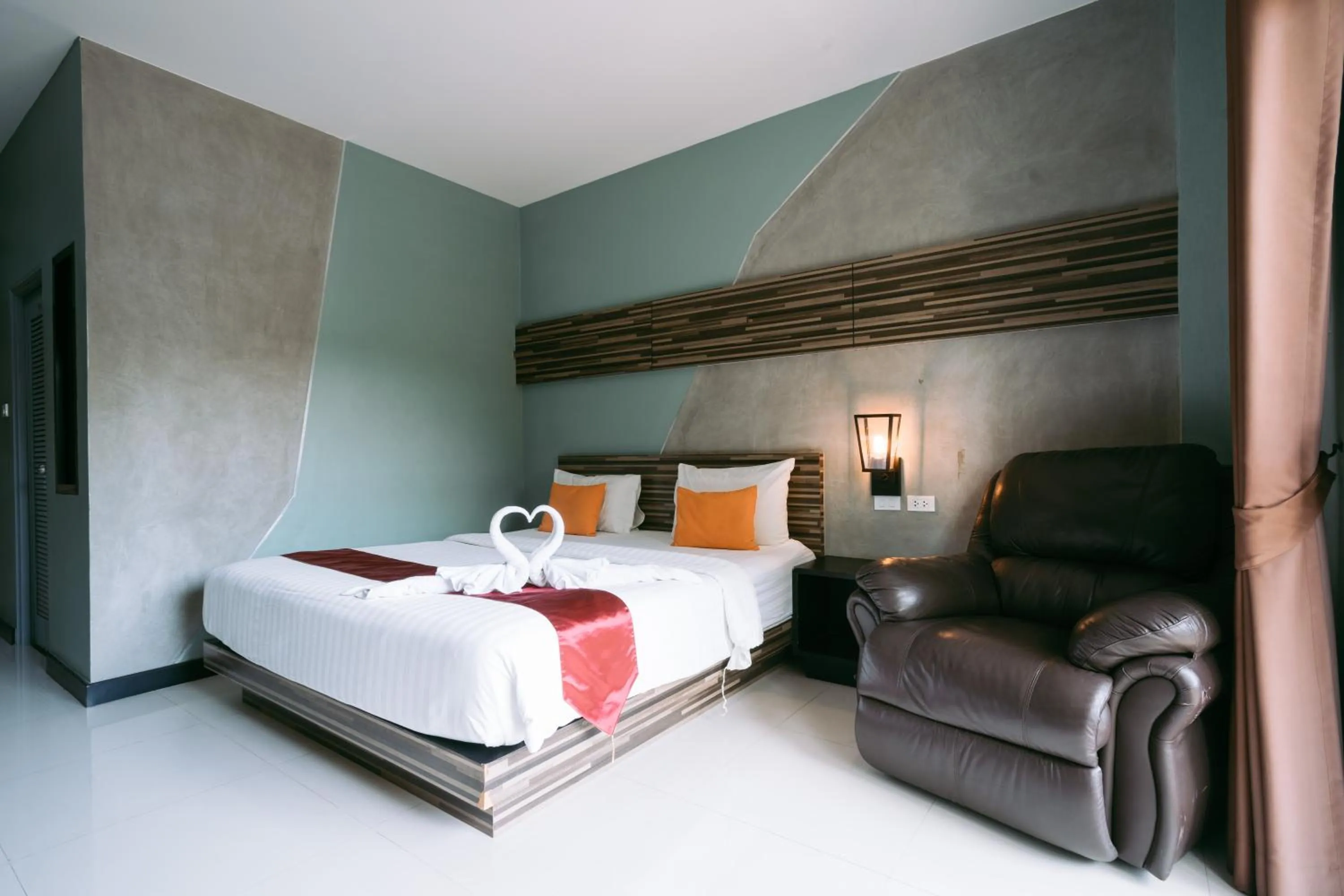 Photo of the whole room, Bed in Ray Hotel Buriram