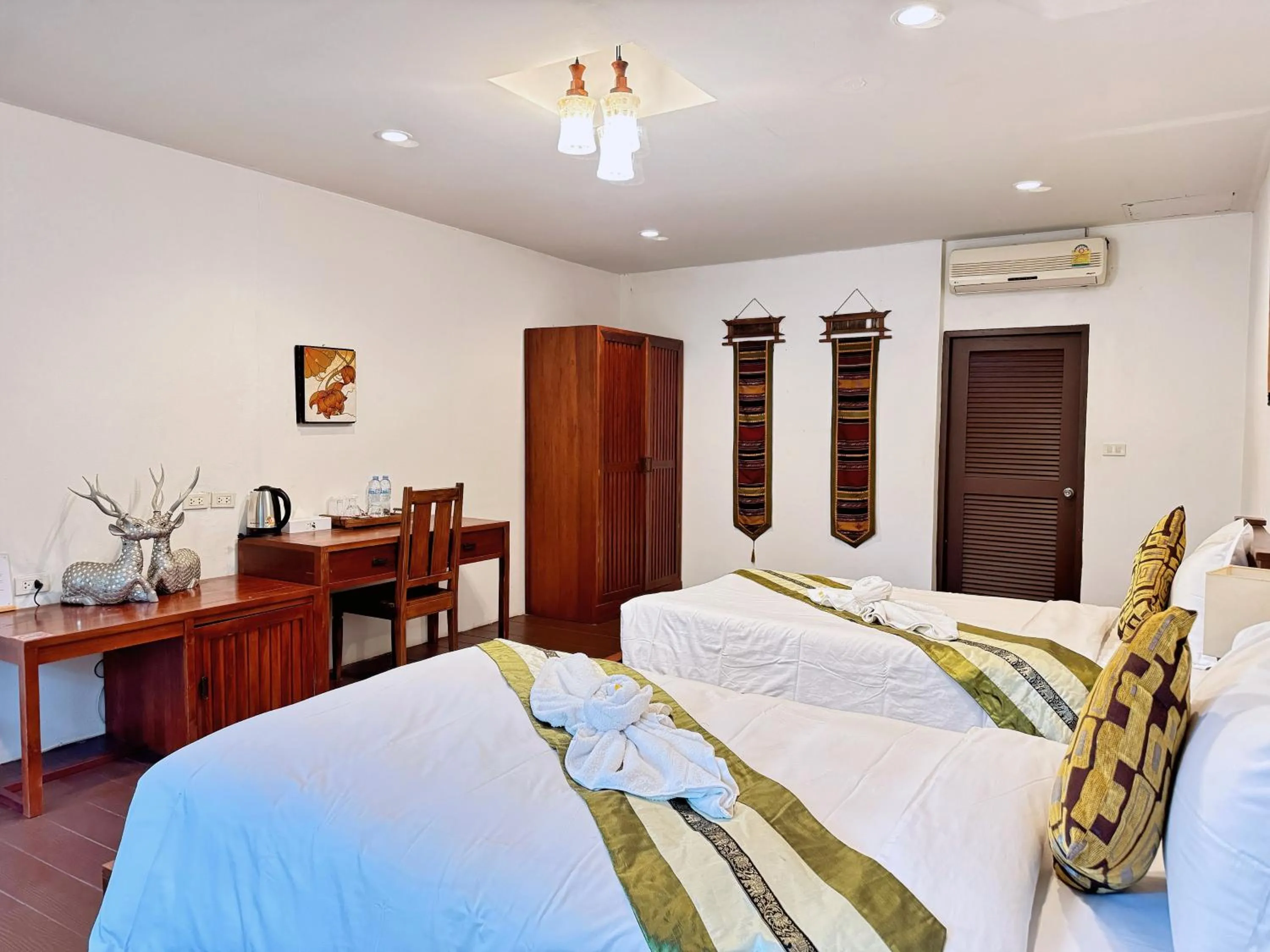 Bed in E-outfitting Boutique Chiang Mai