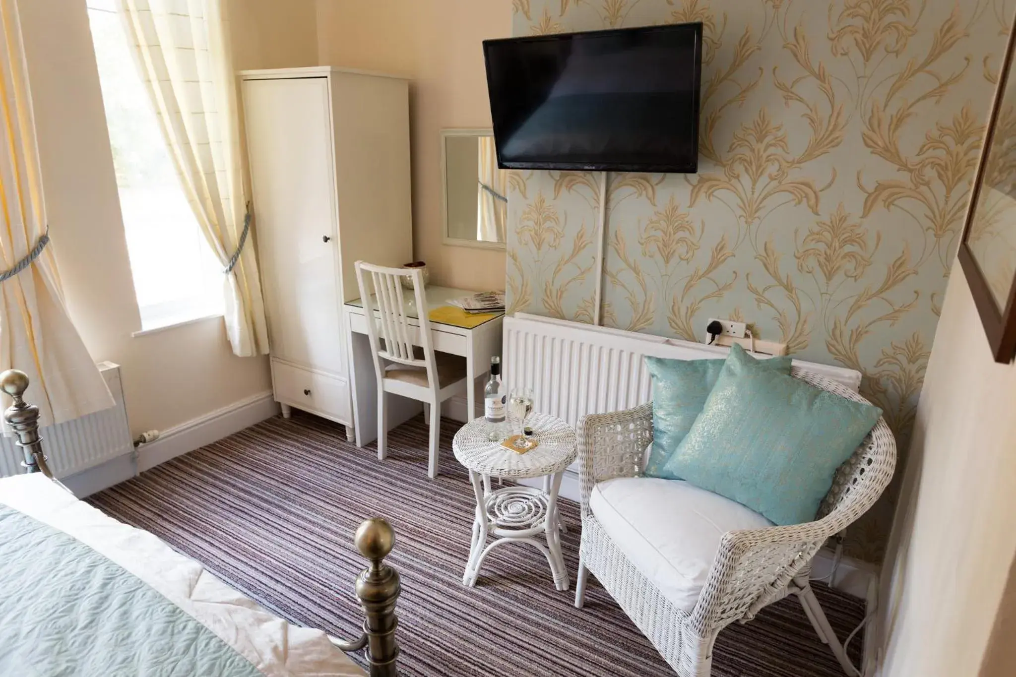 Seating area, Bed in The Ascott Seating area, Bed in The Ascott