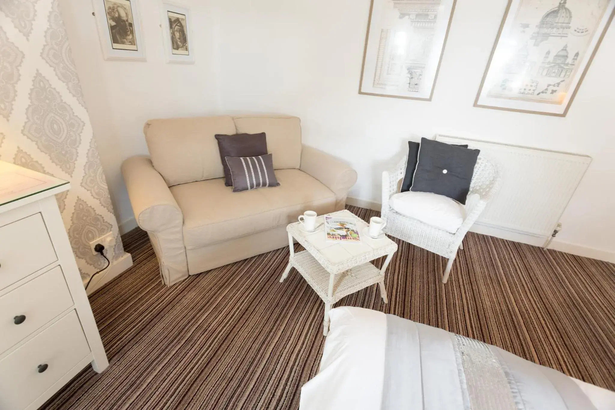 Seating area, Bed in The Ascott Seating area, Bed in The Ascott