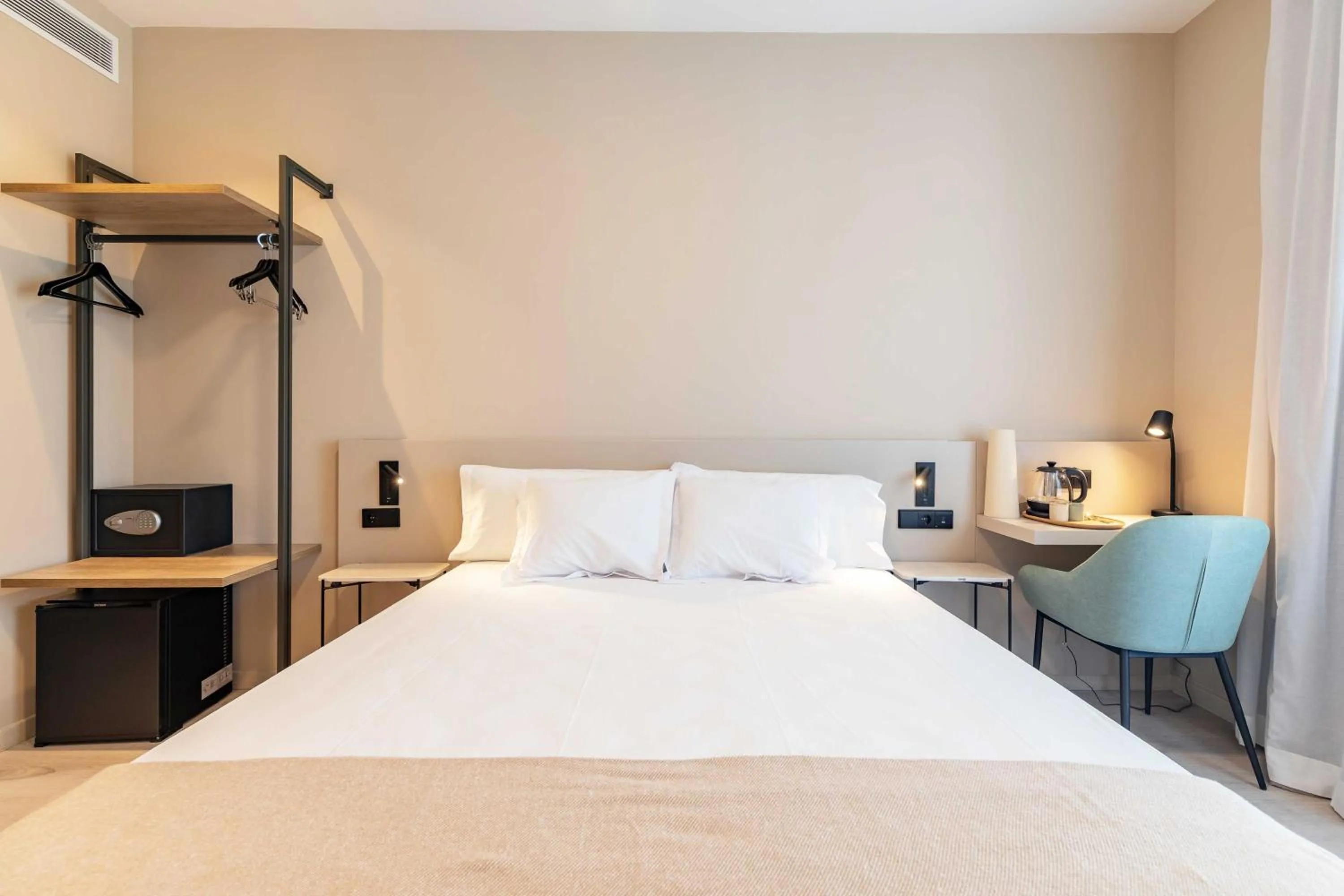 Bed in HQ Arena Hotel