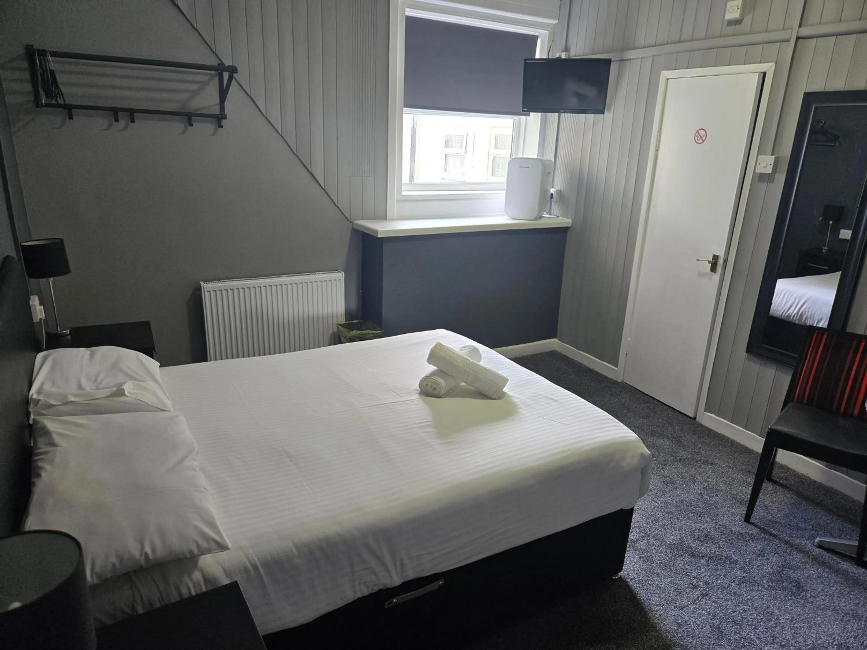 Bed in Peek-a-Booze - Budget Hotel - Adults Only