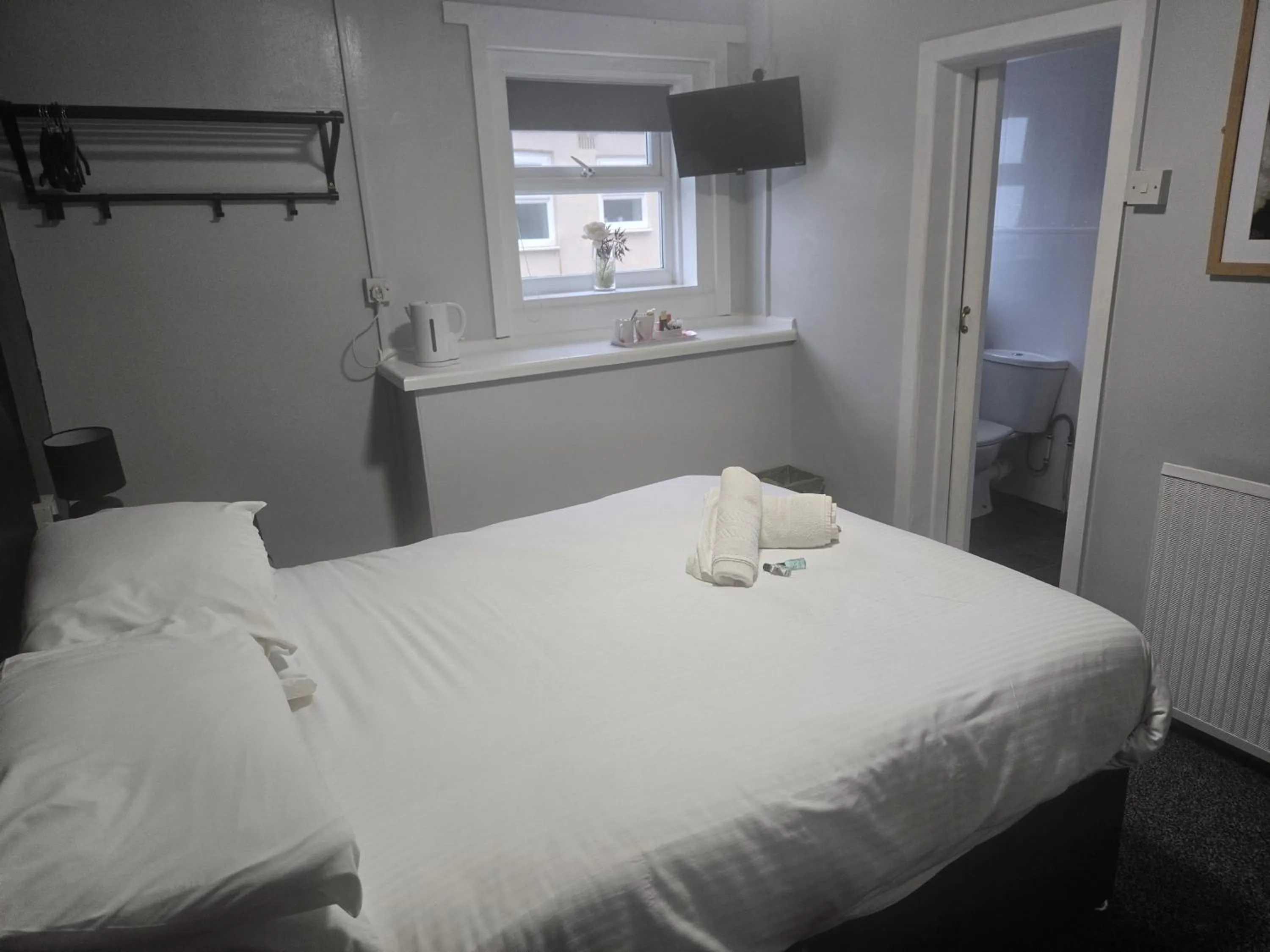 Bed in Peek-a-Booze - Budget Hotel - Adults Only