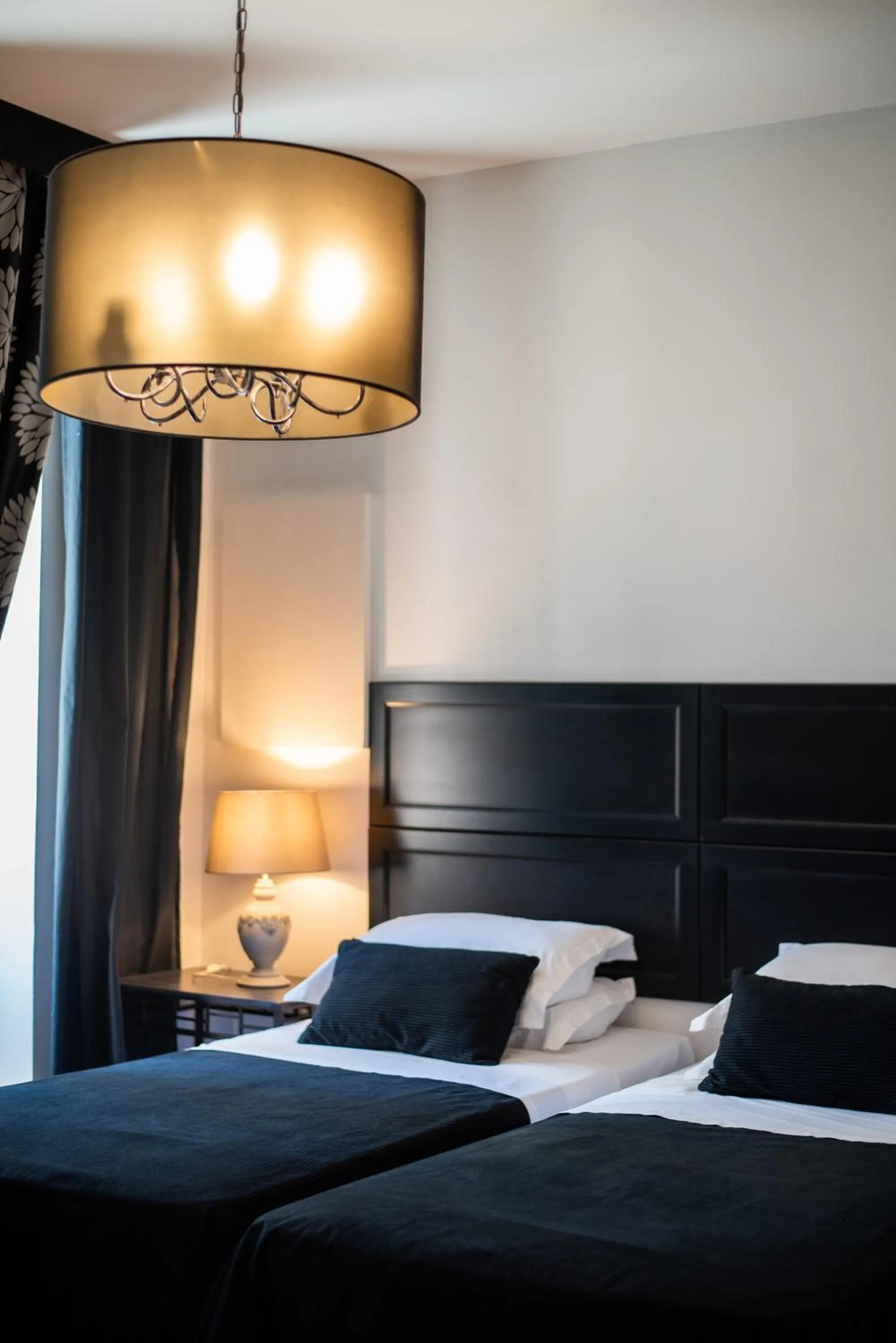 Bed in Emporikon Athens Hotel