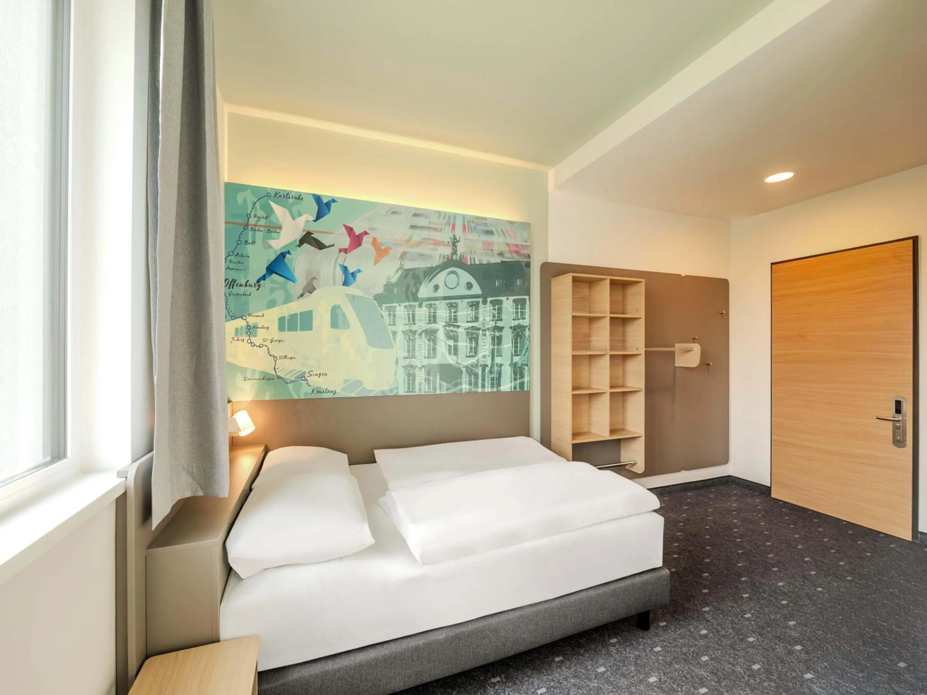 Photo of the whole room, Bed in B&B HOTEL Offenburg-Hbf