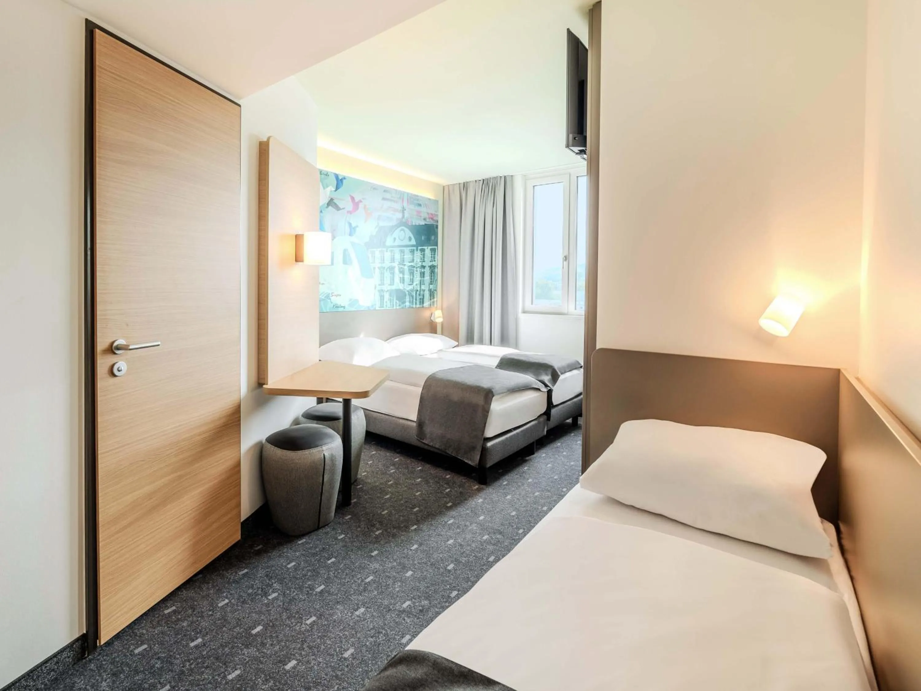 Photo of the whole room, Bed in B&B HOTEL Offenburg-Hbf