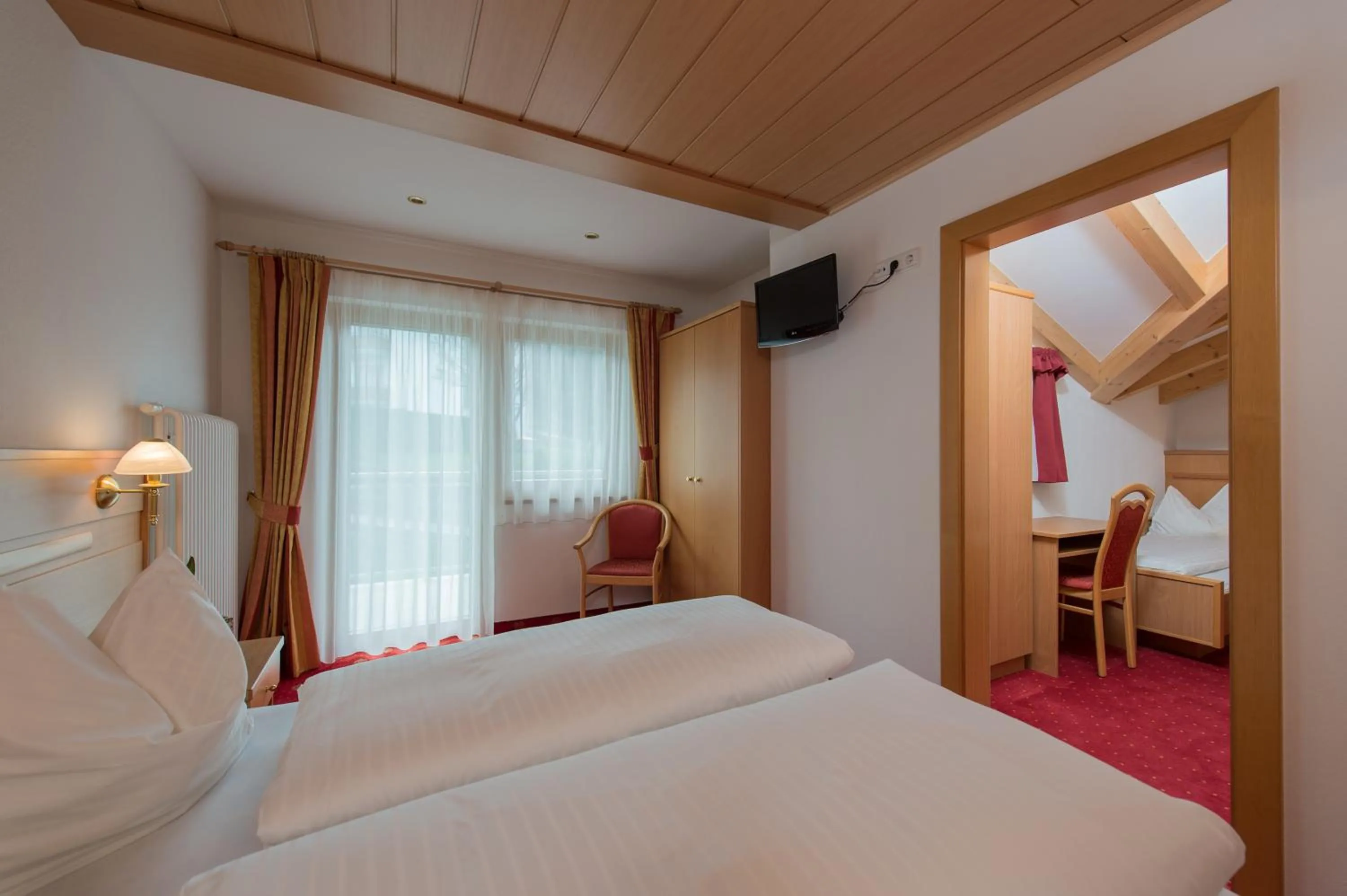 TV and multimedia, Bed in Hotel Garni Hochgruber