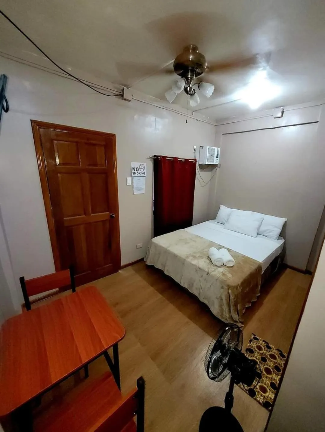 Bed in J & V Oceanview Beach Resort