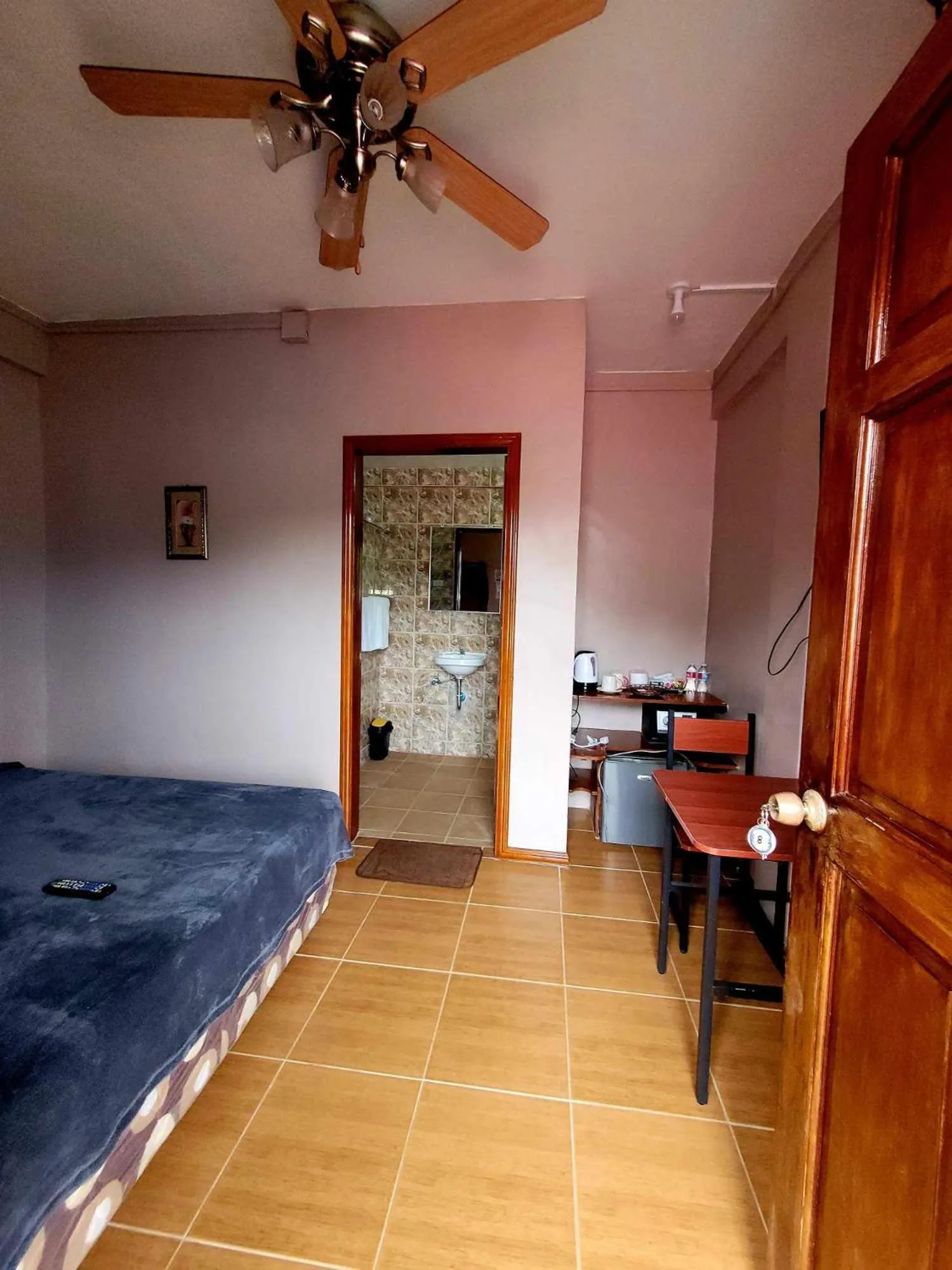 Bed in J & V Oceanview Beach Resort