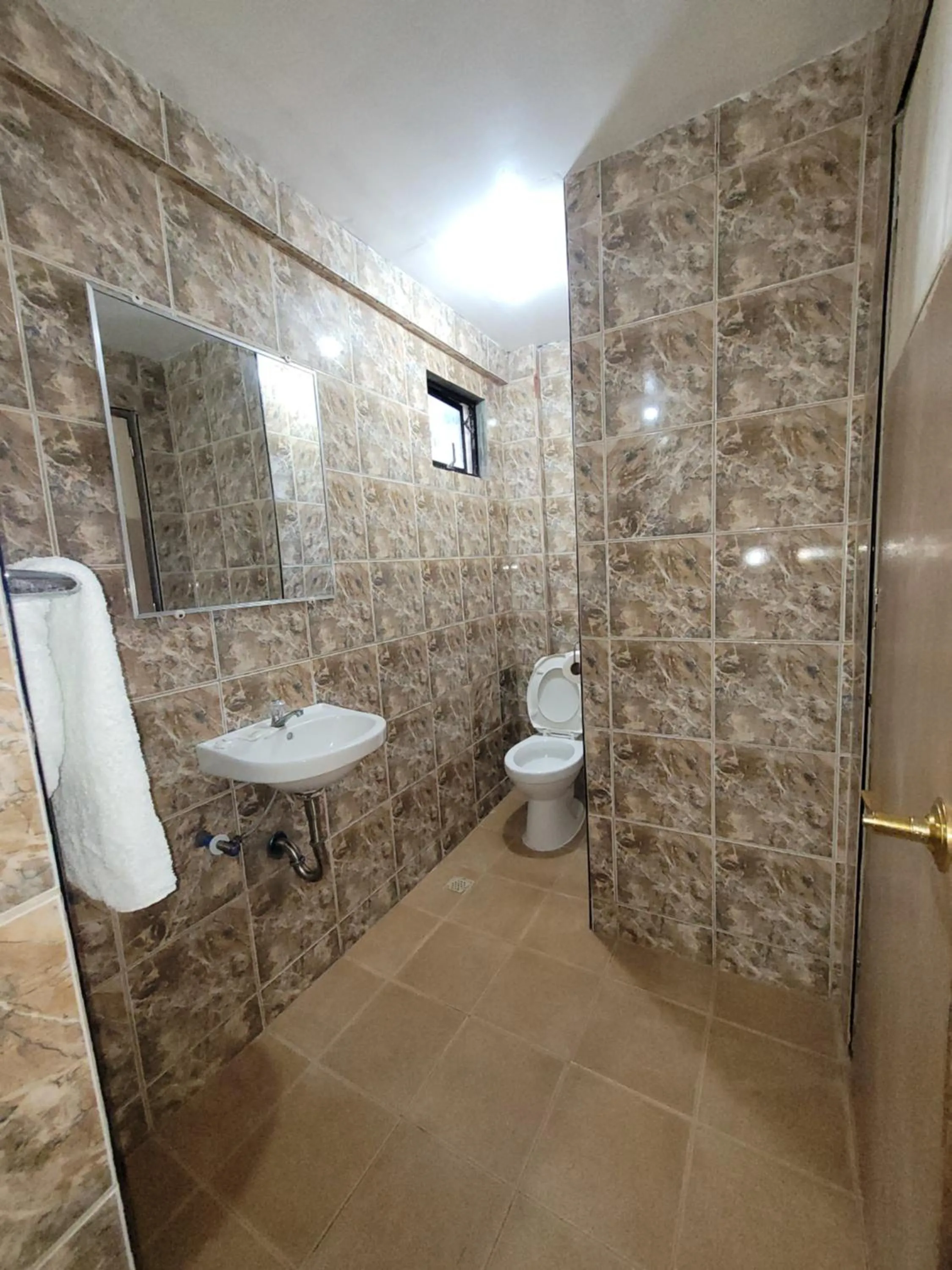 Toilet in J & V Oceanview Beach Resort