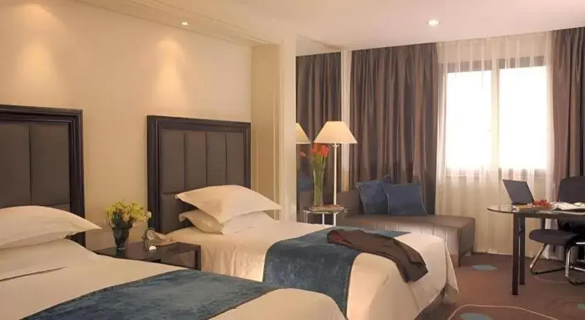 Bed in Jinjiang Metropolo Hotel Classiq YMCA People Square Bed in Jinjiang Metropolo Hotel Classiq YMCA People Square