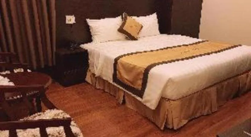 Bed in LUCKY STAR HOTEL