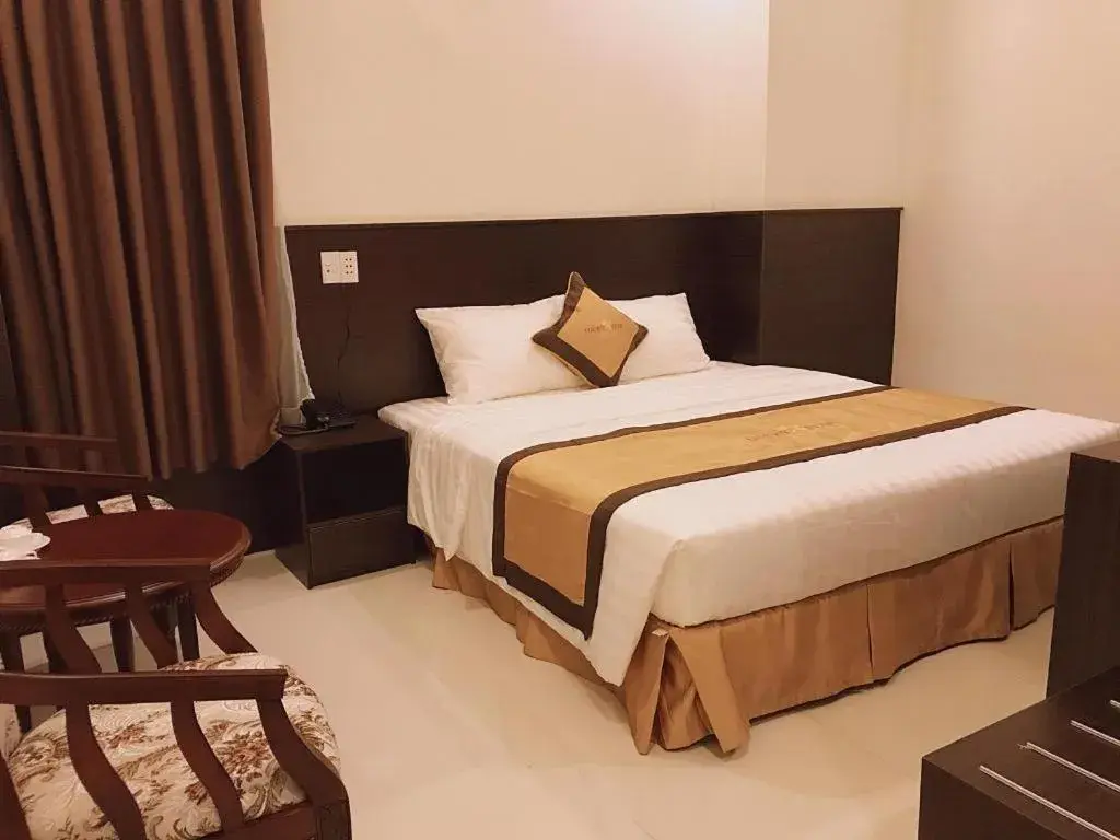 Bed in LUCKY STAR HOTEL Bed in LUCKY STAR HOTEL