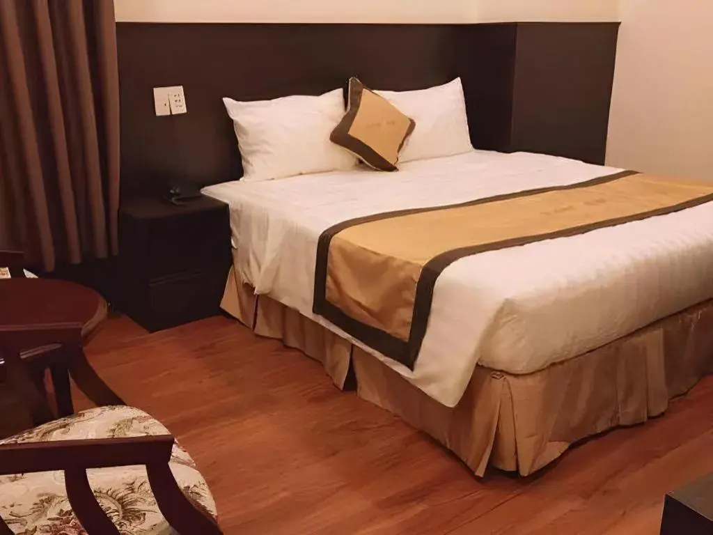 Bed in LUCKY STAR HOTEL Bed in LUCKY STAR HOTEL