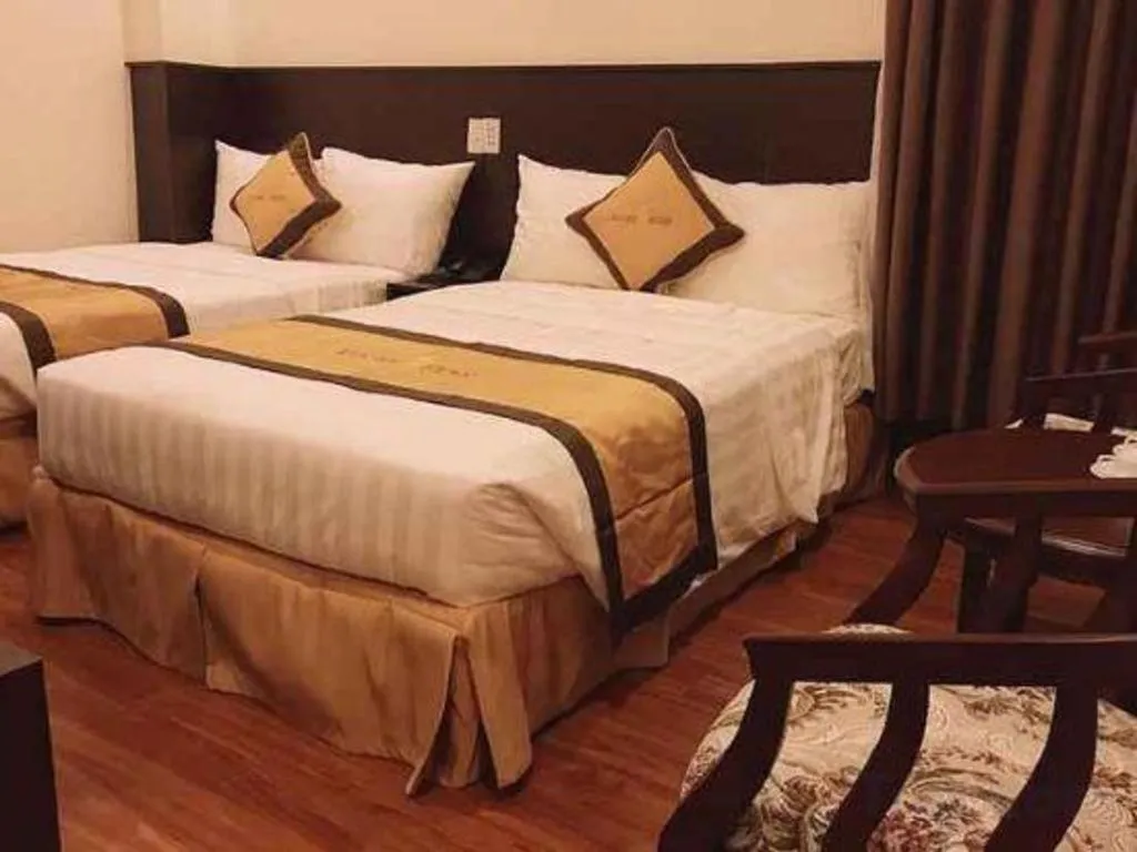 Bed in LUCKY STAR HOTEL