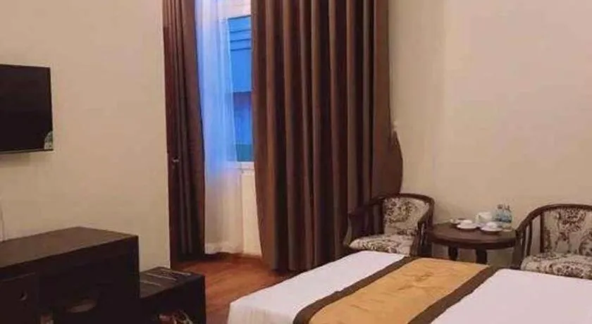 Bed in LUCKY STAR HOTEL