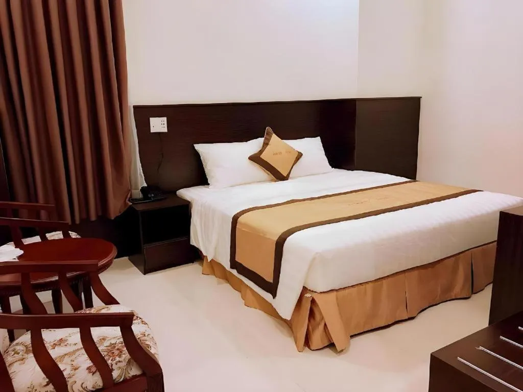 Bed in LUCKY STAR HOTEL