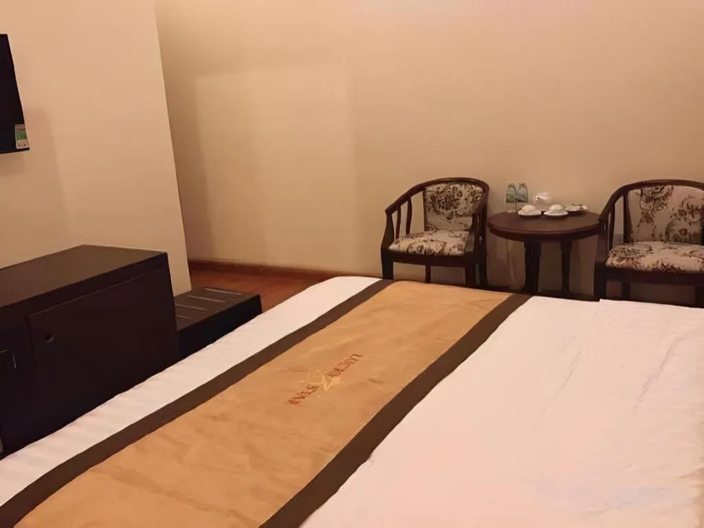 Bed in LUCKY STAR HOTEL