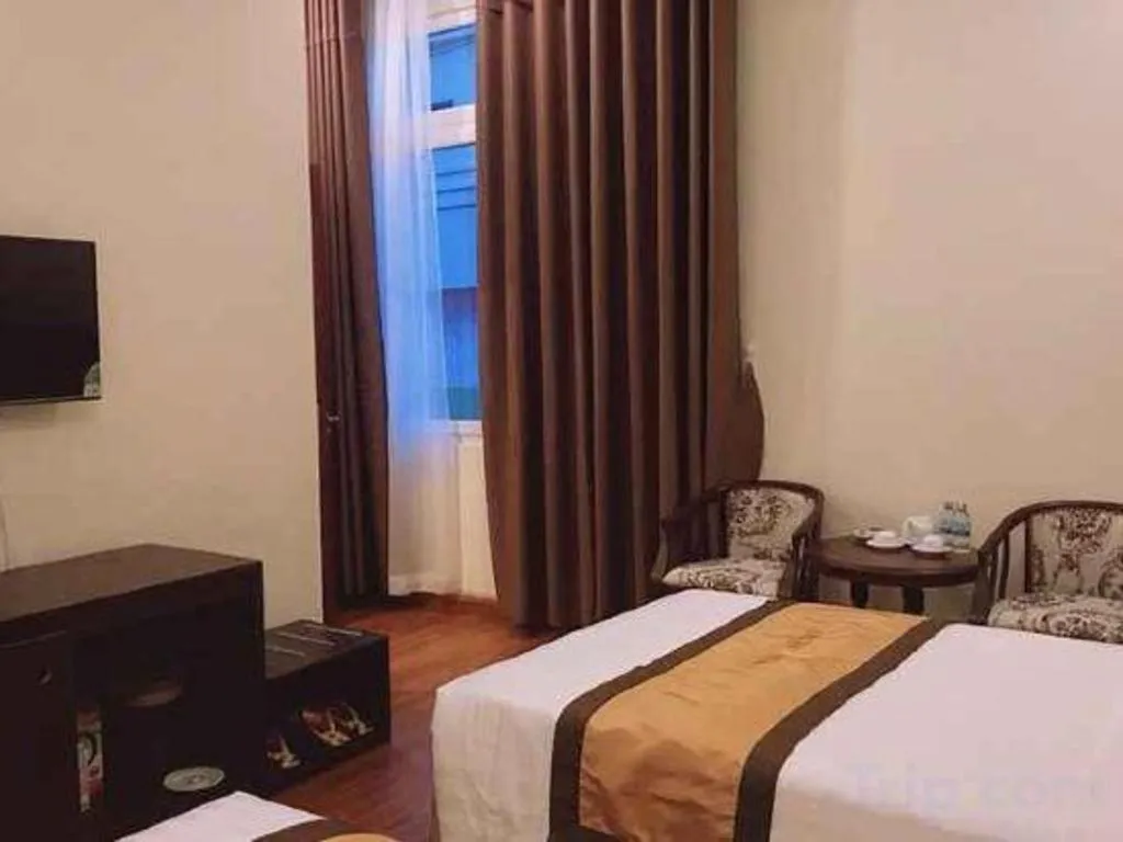 Bed in LUCKY STAR HOTEL