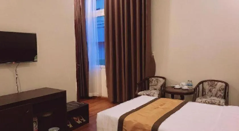 Bed in LUCKY STAR HOTEL