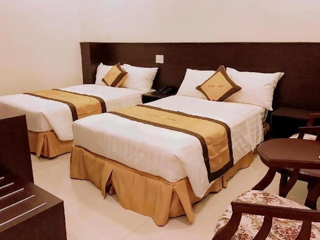 Bed in LUCKY STAR HOTEL