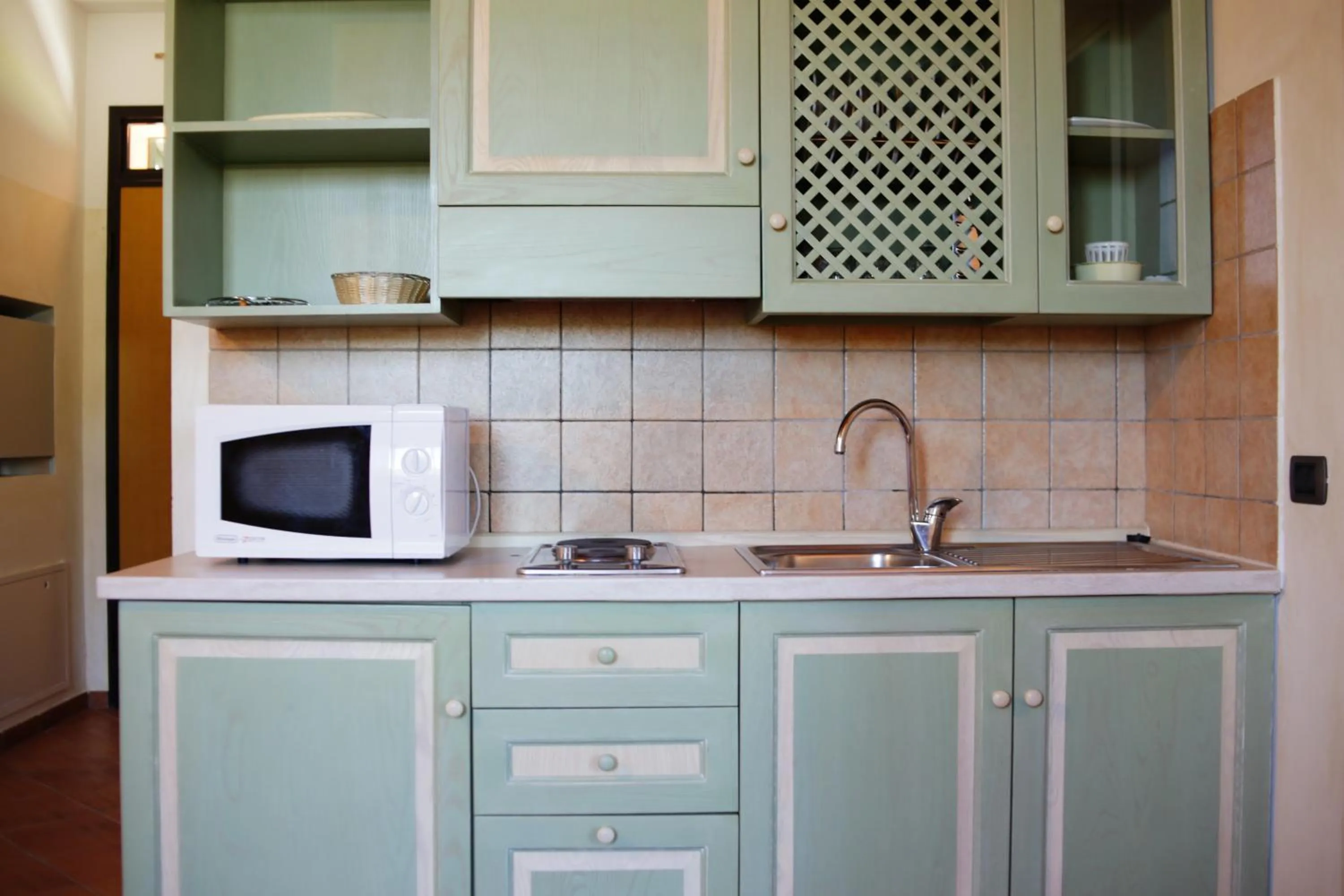 Kitchen or kitchenette in Due Ponti Village