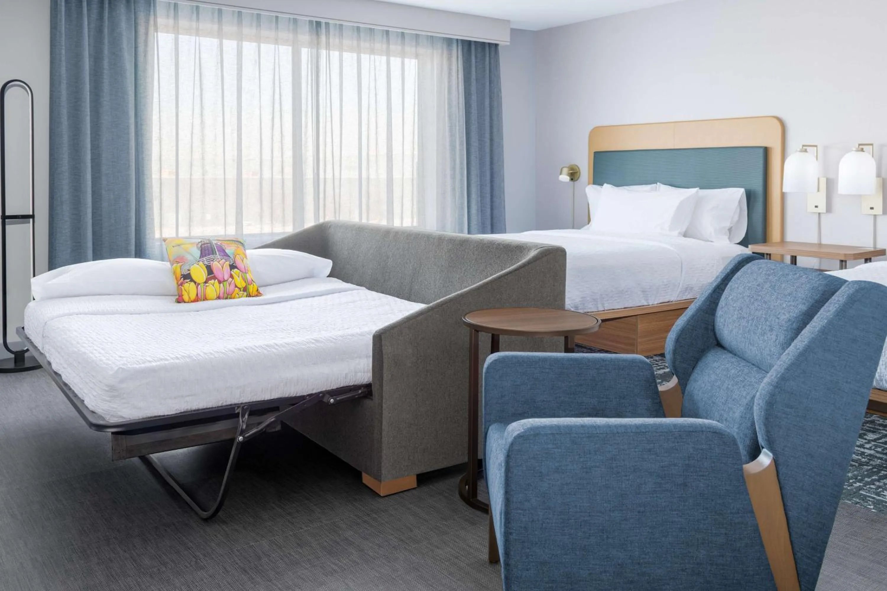 Living room, Bed in Homewood Suites By Hilton Holland