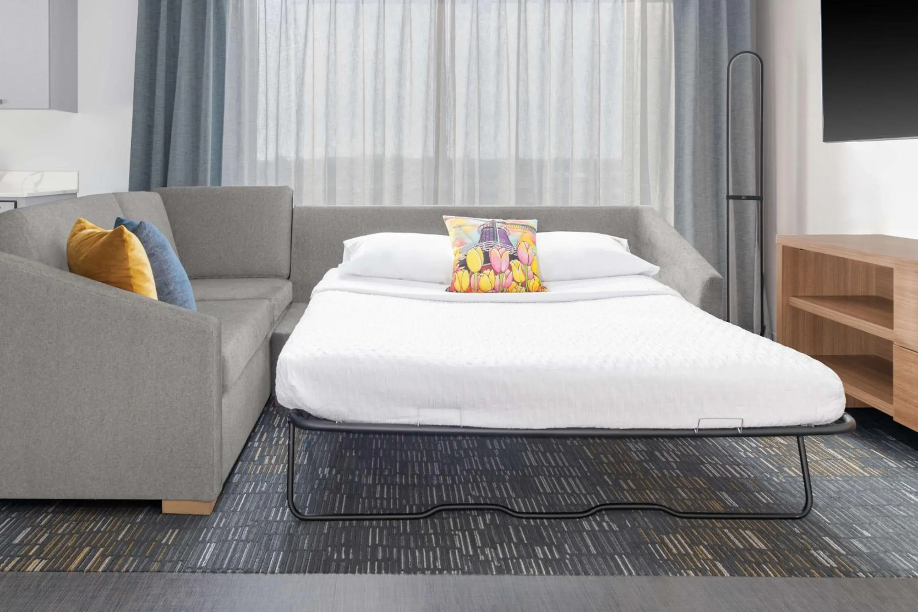 Living room, Bed in Homewood Suites By Hilton Holland Living room, Bed in Homewood Suites By Hilton Holland