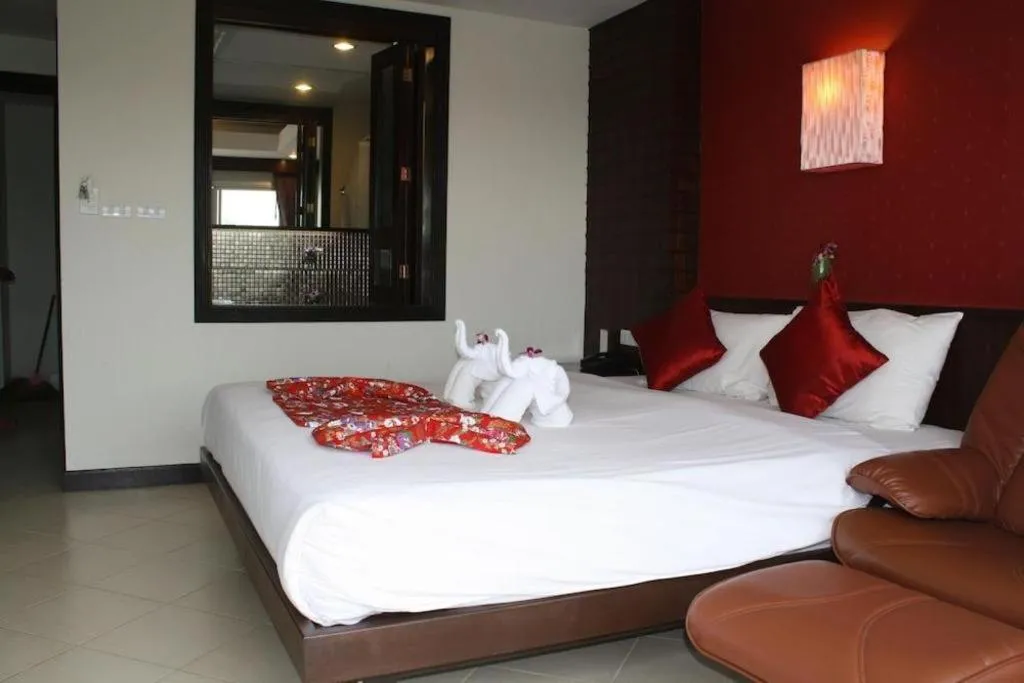 Bed in Wild Orchid Villa Krabi