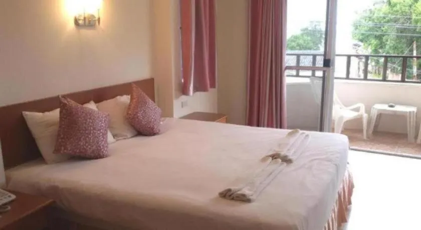 Bed in Wild Orchid Villa Krabi