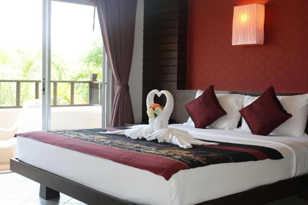 Bed in Wild Orchid Villa Krabi