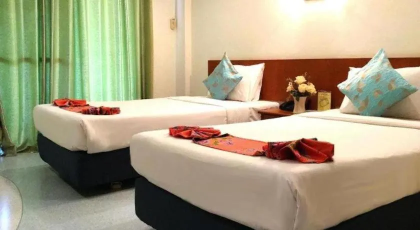 Bed in Wild Orchid Villa Krabi