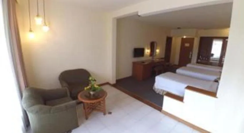 Bed in Purnama Hotel