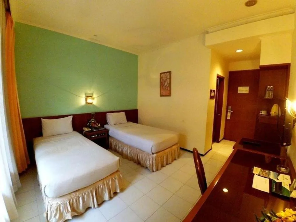 Bed in Purnama Hotel