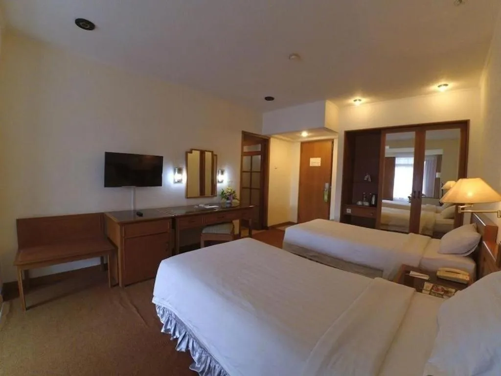 Bed in Purnama Hotel