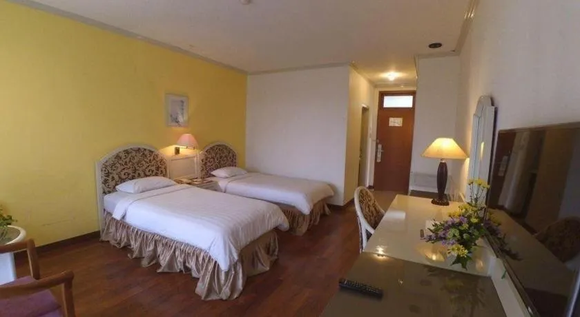 Bed in Purnama Hotel