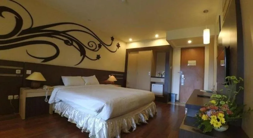 Bed in Purnama Hotel
